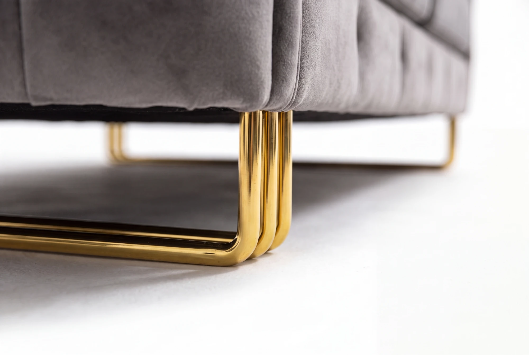 Close-up of the gold-tone sled leg